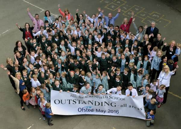 Staff and pupils from Brackenfield School celebrate its outstanding rating from education watchdog Ofsted. Picture by Gary Longbottom.