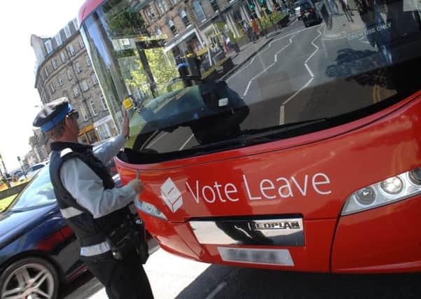 Vote Leave battle bus gets a parking ticket on it's visit to Harrogate.(1605243AM3)