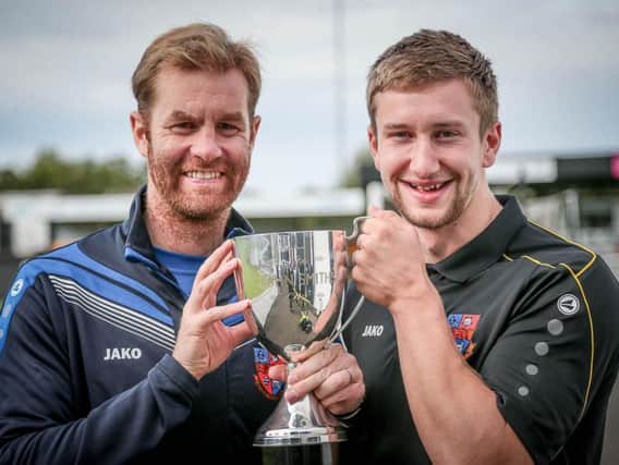 Louie Swain and Simon Weaver with the John Smith's Cup at the start of the season (Photo: Caught Light Photography)