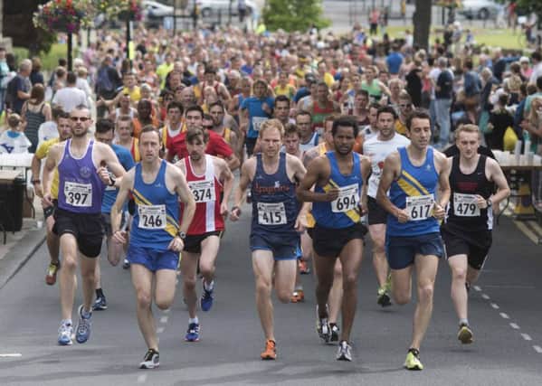 Runners cross the start line at the Town Centre 10k in Harrogate in 2015. (S)