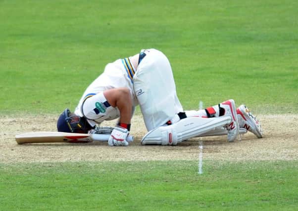 Yorkshire's Tim Bresnan lays out on the floor after being struck in the box.