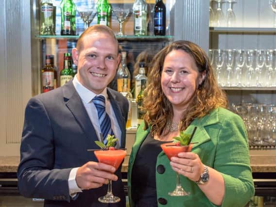 Cheers! Harrogate International  Festivals chief executive Sharon Canavar samples the new cocktail with West Park Hotel manager Nathan George.
