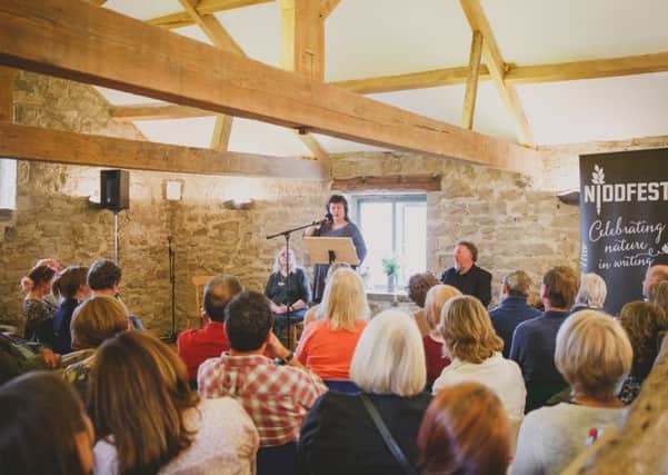 NiddFest patron Carol Ann Duffy reads to a packed audience at least years event.
