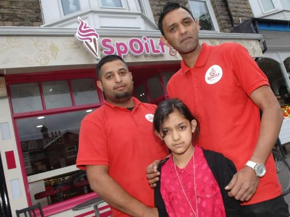 Joint owner of Spoilt Gelato Pajwa Mo (on right) with his daughter Laiqa(9) and joint owner Khuram Jahangir outside Spoilt Gelato in Starbeck.(1607253AM1)
