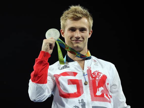 Jack Laugher collects his Olympic silver medal (Photo: PA)