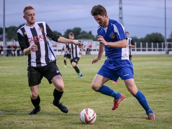 Greg Kidd in action against Athersley Recreation (Photo: Caught Light Photography)