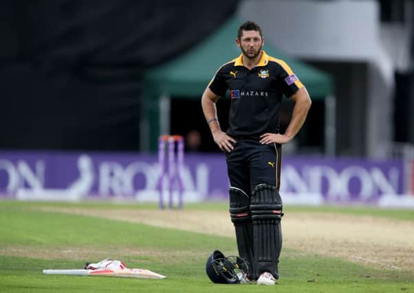 Yorkshire's Tim Bresnan stands dejected after defeat in the Royal London Cup semi-final at Headingley. Picture: Richard Sellers/PA.