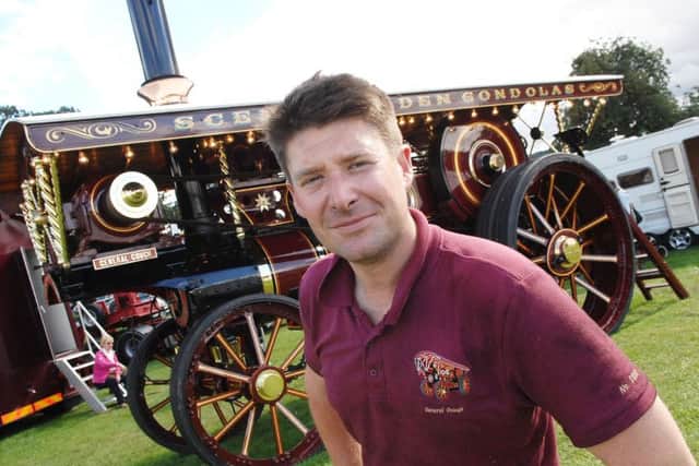 NAWN 1609041AM2 Harewood Steam Fair. Oliver Maslin with a 1921 Burrell Showmans Road Locomotive. (1609041AM2)