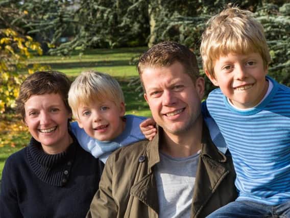 Jo Beagley, her husband Rob and their two boys. Picture: Carl Summerscales