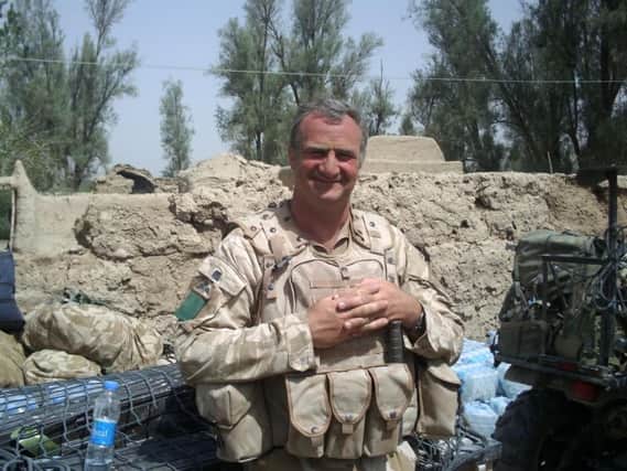 Hampsthwaite's Parachute Regiment Major Gordon Muirhead MBE in the Helmand Valley war zone in Afghanistan .