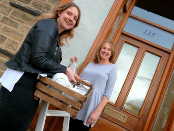 Mum-and-daughter team Sue and Lizzie Warburton outside their new Harrogate cafe, The Kitchen.