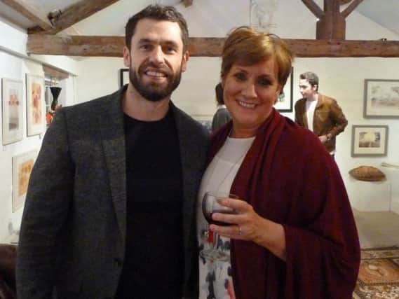 Artist Holly Holder with Emmerdale actor Kelvin Fletcher at Art in the Mill gallery in Knaresborough. (Picture by TOUCAN PR)