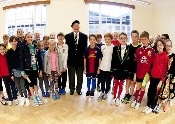 Laurie Burn with pupils at Highfield Prep School