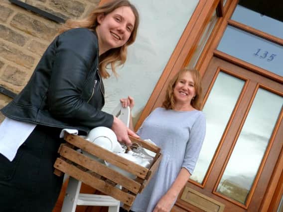 We're open! Mum-and-daughter team Sue and Lizzie Warburton as they prepared to open The Kitchen today on Otley Road in Harrogate.