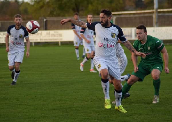 Jono Greening looks to get on the ball during Tadcaster Albion's defeat at Burscough. Picture: Matthew Appleby