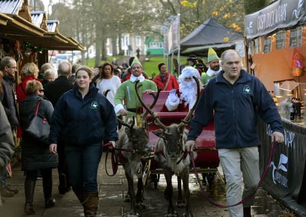 191115 Father Christmas arrives at the  Harrogate Christmas market  on his sleigh pulled by reindeers  to officially open the Harrogate Christmas Market  yesterday(thurs) (GL1008/07b)