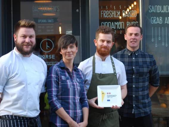 The Norse team with their two AA Rosettes plate: sous chef Marcus Fisk, server Kasia Michel, head chef Simon Jewitt, and restaurant manager Gareth Baker.