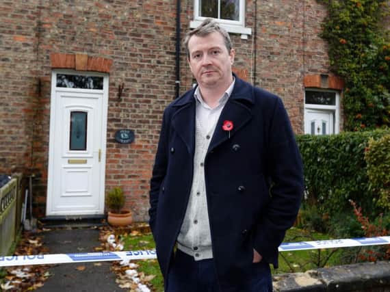 Ben Bramley who lives in the property which has been majorly affected by the sinkhole - Glen Minikin
