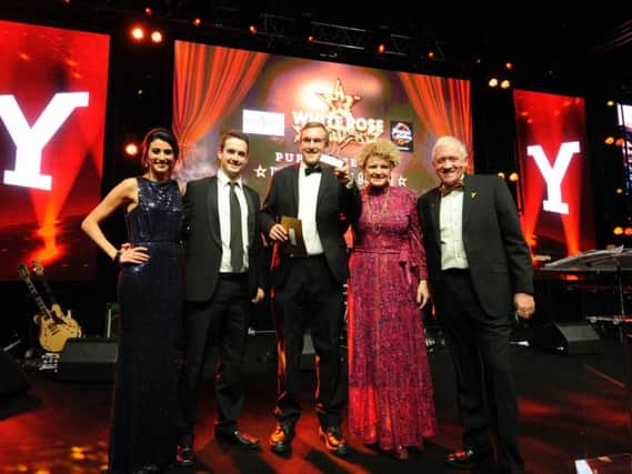 The White Rose Awards - Winner of the Pub of the Year, The Coach and Horses with general manager Dan Howard, centre. Picture by Simon Hulme)