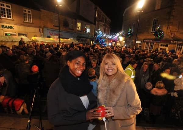 24 November 2016.......  Kadeena Cox and Christine Talbot  switch-on Wetherby christmas lights. Picture Tony Johnson.
