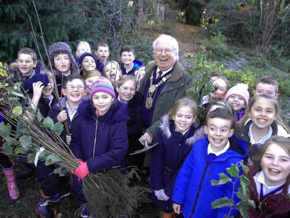 National Tree Week: The Mayor of Harrogate Coun. Nick Brown helps youngsters from Coppice Valley Primary School to plant trees to celebrate National Tree Week.
(1611293AM1).
