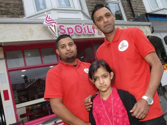 Joint owner of Spoilt Gelato Pajwa Mo (on right) with his daughter Laiqa(9) and joint owner Khuram Jahangir outside Spoilt Gelato in Starbeck.(1607253AM1)