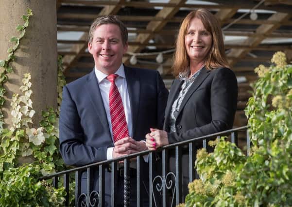 Lee Hurst and Lynne Bowman of Harrogate Wealth Management. (S)