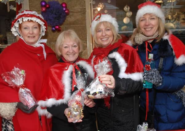 Wetherby Dickensian Christmas Market this Sunday, December 11.  Pictured from last years market are members of the Wetherby Musical Theatre Group Linda Young, Elsie Johnson, Marie Clinker and Beverly Lyn.