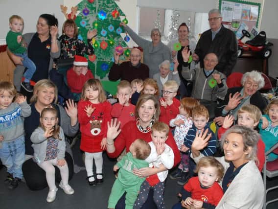 Little ones from Oatlands Pre-School who entertained at Oatlands Community Groups Mince Pies and Memories event, with organisers and attendees.