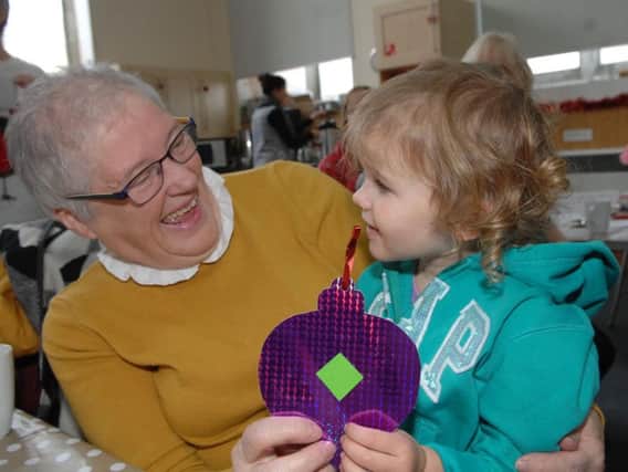 Kay Smith with Lois Love, two, at a recent event organised by Oatlands Community Group. (1612053AM1)