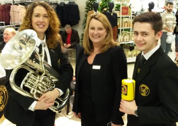 Members of the Band with Dawn, M&S Manager, Harrogate