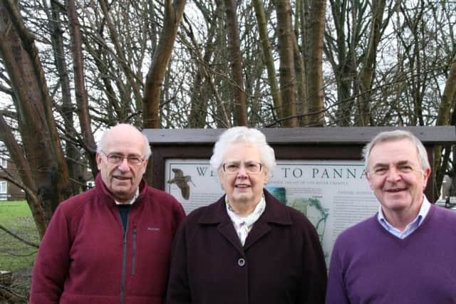 Pannal Village Society celebrate their success in the battle for a Pannal Parish Council: former chairman Peter Stretton,  Dorothy Little, secretary, and Howard West.