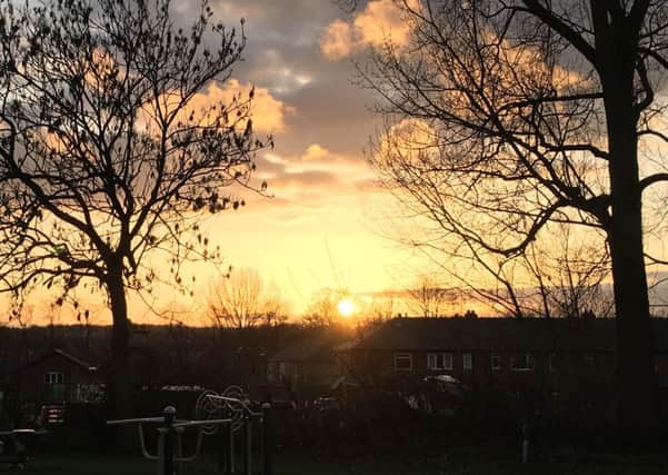 Vew from Starbeck Park, framed by one of the climbing frames - the last sunset of 2016, by Nick Lamming.