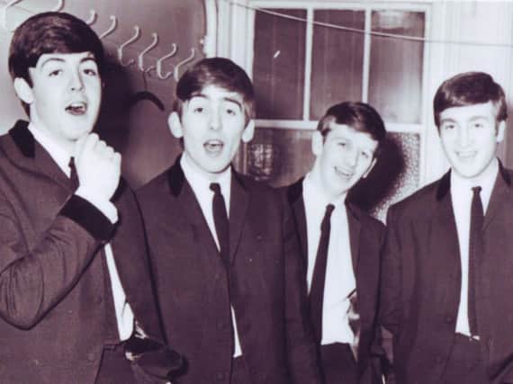 The young Beatles back stage at Harrogate's Royal Hall in 1963. (Picture by Bob Mason).