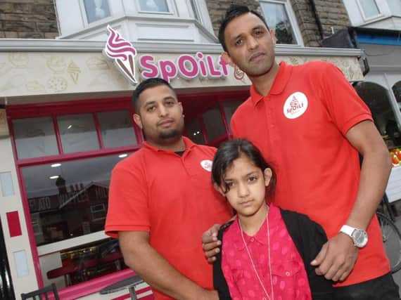 Joint owner of Spoilt Gelato Pajwa Mo (on right) with his daughter Laiqa (9) and joint owner Khuram Jahangir outside Spoilt Gelato in Starbeck.(1607253AM1)