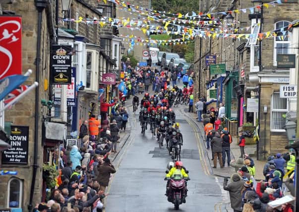 Crowds in Pateley Bridge welcomes riders in last year's Tour de Yorkshire.