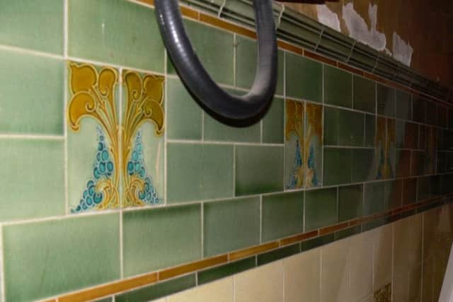 ome of the Art Nouveau tiles hidden behind modern walling at Ripons Pump Room. (Copyright - David Winpenny)