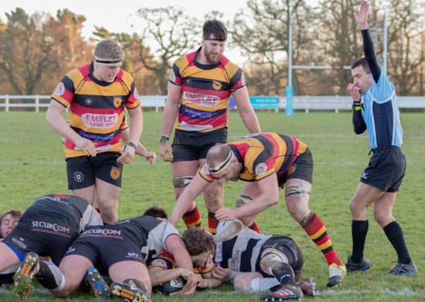 Guy Coser squeezes over for a try as Harrogate RUFC beat Luctonians in National Two North. Picture: Richard Bown