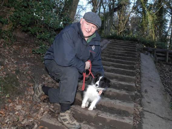 Coun Stuart Martin with his dog Meg on the Fairy Steps.(1710141AM2).