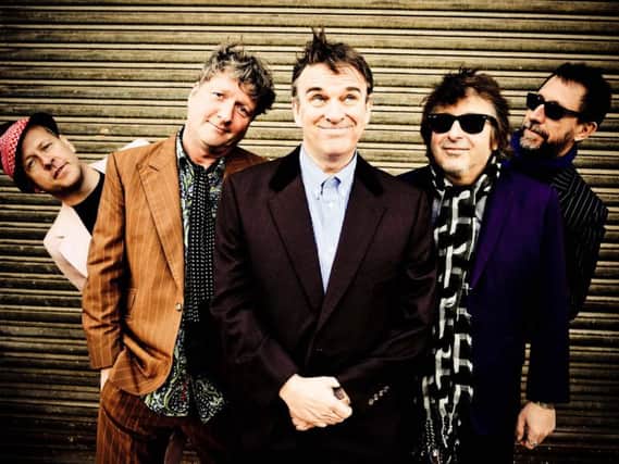 Chris Difford, centre, pictured with Squeeze.