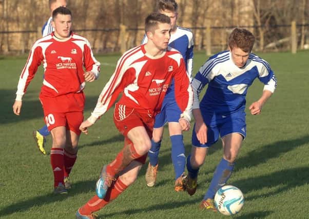Kirkby Malzeard (red kit) won for the first time since April when they beat Pannal Sports