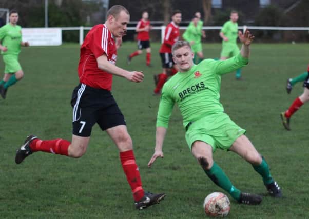 Jonty Maullin takes the ball past a Selby defender. Picture: Craig Dinsdale