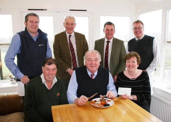 Ian Bell, chief executive of the Addington Fund, prepares to tuck into his charity breakfast, joined by hosts Chris and Christine Ryder. Standing, from left, are Barclays regional agricultural manager Ian Robson, Craven Cattle Marts general manager Jeremy Eaton, CCM director Kevin Wilson and Barclays regional agricultural director John Pinches (s).