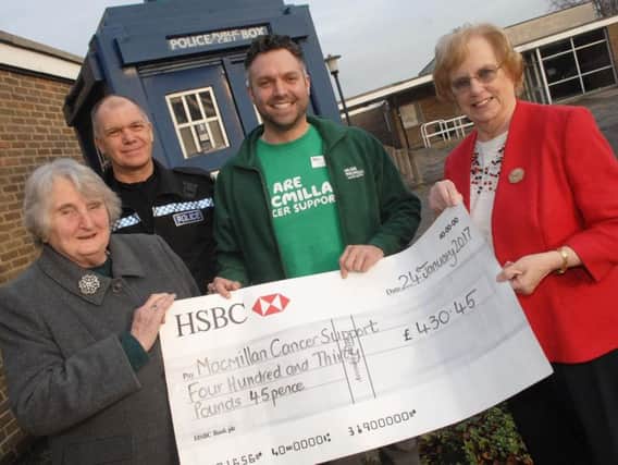 Patricia Bullough and Maureen Brewer B.E.M of The Wetherby District Crime Prevention Panel along with Wetherby Ward Officer Steve Atkinson present a cheque to Matthew Jameson of Macmillan Cancer Support to the value of 430.45
