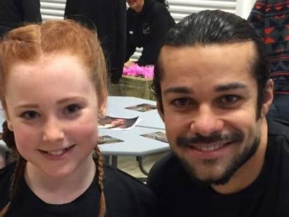Little Coral with Junade Khan who plays Ash Roy in Hollyoaks. Picture: Kim Mason