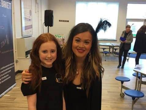 Coral with the founder of the academy, Zoe Birkett. Picture: Kim Mason