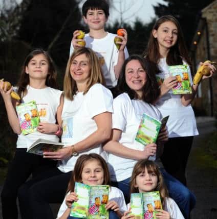 Bardsey mums Hayley Dodsworth and Donna Harrison, right, launch their book  Emma Bright and The Super Food Fight, to encourage fussy eating children to try new foods. Pictured with children clockwise from left, Oliva Dodsworth, Peter Harrison, Emma Dodsworth, Lyla Harrison and Anna Dodsworth.
2nd February 2017.
Picture : Jonathan Gawthorpe