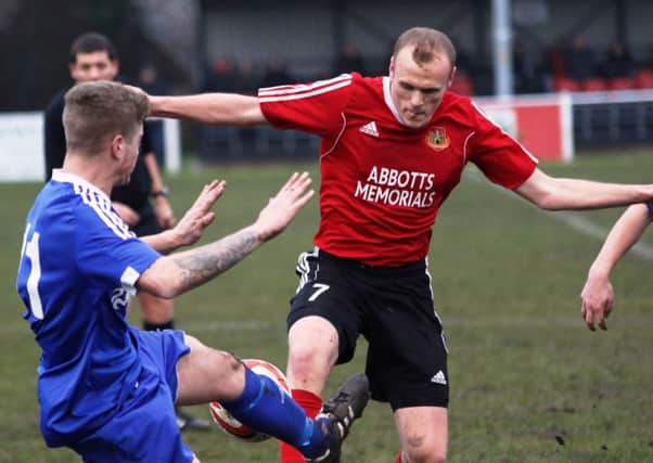 Jonty Maullin battles for possession during Knaresborough Town's home win over Winterton. Picture: Craig Dinsdale