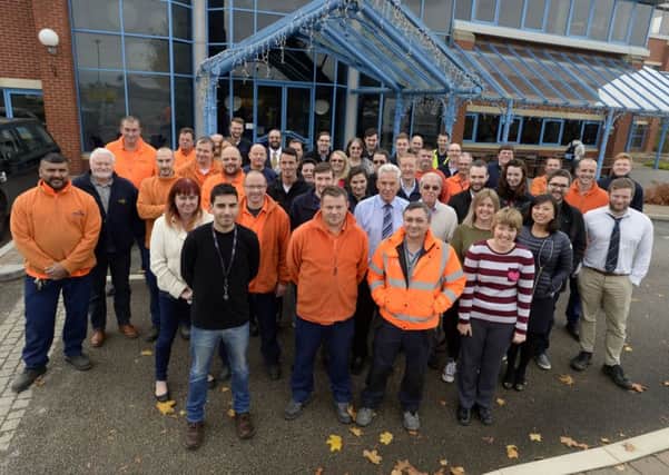 Management and staff at Belzona Polymerics in Harrogate.  			       PHOTO: Bruce Rollinson.