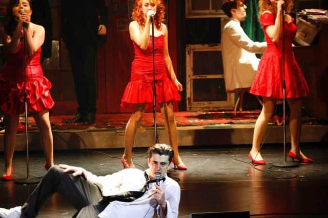 Christina Tedders and real life sisters Leah and Amy Penston, as backing singers The Commitmentettes with lead singer Brian Gilligan as Deco.